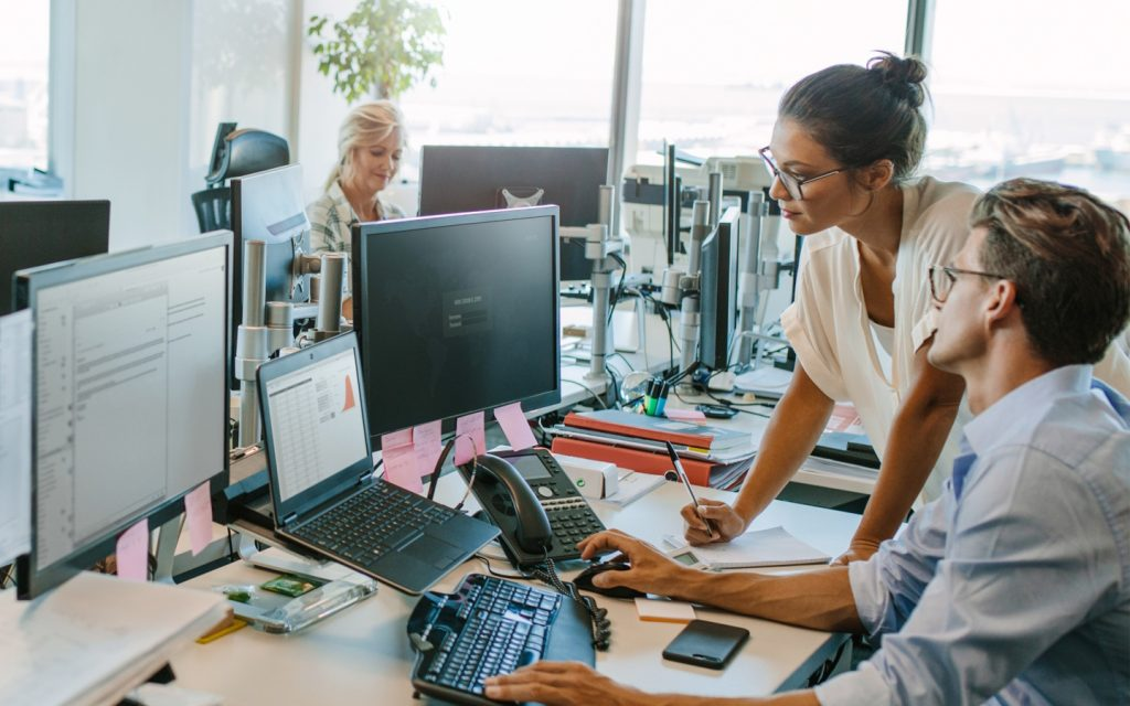 Equipe da Vitaly analisando os números de um cliente